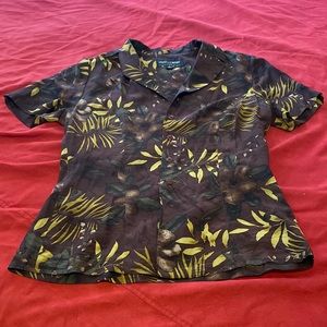 Multi colored button up blouse  Short sleeve.  No smoking home